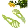 Avocado Slicer Pit Kiwi Fruit Multifonctionnel Péler de pâte séparateur en plastique outils de coupe de couteaux accessoires de cuisine