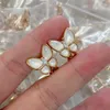 Charme de créateur Van Gold plaqué Mijin White Fritillaria Butterfly oreille RS Version Sweet and Elegant Impossible Oreadds