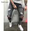 Heren jeans sexy gescheurde denim broek mannen casual potlood demin street slijtage 2024 European and American Style Fashion Trouser