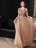 Runway Dresses Luxury Champagne Prom Dress Off Shoulder Sparkly Bead Sequin Sleeveless Tassel A Line O Neck Women Wedding Party Celebrity