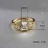 バンドHuitan Luxury Tiny Shiny CZ Stone Engagement Ringsロマンチックなゴールデンカラーバレンタインデーギフトガールフレンドソリティアミディリング