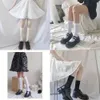 Strumpor kvinnor jk svart långa strumpor tunna höga knäflickor kawaii fast nylon strumpa kvinnliga ben calcetines medias