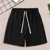 Shorts maschi in tessuto da forno atletico estivo con tasche elastiche della vita da coda gamba che corre in colore solido