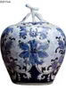 Bouteilles de style de style chinois réservoir bleu et porcelaine blanche rétro avec décoration de couverture artisanat vase thé caddie décoratif minuscule