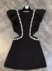 Abiti casual High Street EST 2024 Designer di moda Fashion Designer Flying Maninges Round Neck Bildded Diamond Hollow Out Dress