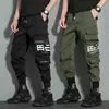 Pantalon masculin Classic Strtwear Casual Men Ribbons Harem Jogging Pantalging Male Slim Fit Spring Cargo Pantal