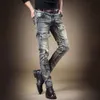Herrfjäder nya motorcykel jeans, ungdomsmode, retro trend, temperament, smal passform, små fötter blyertsbyxor