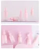 Dekorative Figuren 15pcs 5-100 ml Glas Tropfen Flasche Flüssigkeit Pink Cap Serum/Essential Basic Pipette Nachfüllbar