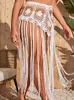 Robes décontractées de base plus taille de plage de plage couvre-mail de maillot de bain boho see à la taille creux de bandage haute robe tassel