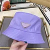 Simple designer hat re nylon bucket hats triangular yarn dyed cappellino classic sunlight flat caps casquette luxe baseball cap for men wholesale mz01 H4