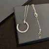 Hoogwaardige luxe ketting modieuze en veelzijdige nagelketting hanger met diamanten sleutelbeenketen voor mannen vrouwen licht luxe valentijnsdag