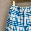 High -end Buurberlyes -kostuums voor vrouwelijke mannen Nieuwe blauw witte plaid Drawtring rechte shorts senior merk Casual zomerontwerper shorts