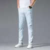 Mäns jeansdesigner 2023 Ny high end koreansk elastisk tryck ungdom Slim Fit Small Feet Casual Cotton White Pants Jam5