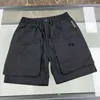Shorts d'été Man Floral Printed Gym Sports American Korean Beach Sauthouet pour les hommes Pantalons de cargaison de couleur noir massif LOBE 240423