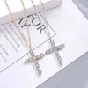 قلادة العلامة التجارية الفاخرة Tiffenny Designer قلادة قلادة S925 Sterling Silver Cross Necklace مع ثمانية قلوب وسهام الزركون للرجال نساء