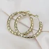 Boucles d'oreilles Hoop Europe et les États-Unis 2024 Twist Twist Circle sinueux Cercle de femme en acier inoxydable Luxury