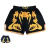 Shorts masculins entraînant le muay thai combat