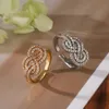 Europe et les États-Unis Fashion Lumière Luxury Cuivre plaqué zircon Géométrique ouverture féminine Niche exquise Ring High-Grade