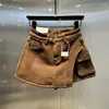 Saias 2024 Veludo de outono/inverno e design espessado pareça embrulhada Hip Salia curta Feminina lateral de bolso feminino roupas femininas