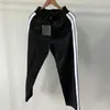 Designerskie spodnie męskie luźne mężczyźni jesień sportów zimowych długie spodnie spodni zamka spodnie swobodne męskie dresowe liter