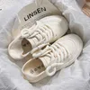 High Beauty Little White Shoes Women's Autumn New Canvas Shoes Breattable och kjol parade skor halvt drar och en fotkvinnor skor