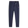 Pantalon masculin baisheng printemps et automne simple fat guy pieds