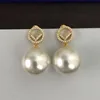 Korte vrouwenontwerpers Stud Gold Earring Diamant Pearl -oorbellen Ear Stud Dames Designer Studs Birthday Gift Letters F 22112106277L