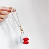 Figurines décoratines Perles Keychains d'alliage perlé pour femmes sac de voiture minimaliste Bluetooth Clé des anneaux
