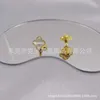 Fanjias de style classique de qualité supérieure Nouvelle boucles d'oreilles de trèfle à quatre feuilles Classe d'oreille Titanium Steel 18K non décolor