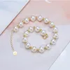 Braccialetti di fascino perla natrual rotonda di acqua dolce per donne gipli da bambina a filo oro giallo reale 18k 2303072477