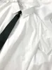 メンズカジュアルシャツゾキホワイトシャツ女性ファッションブラックネクタイ日本語スタイルの準備jkガールズシャツシンプルソリッドルーズサマーボタントップyq240422
