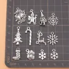 チャーム12pcs/lotクリスマススノーフレークエルク雪だるまサンタクロースツリーコレクションジュエリーメイキングアクセサリーの女性