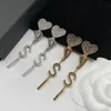 Marca da moda CZ Letra de diamante Dangle Brincha Ear manguito clássico designer tamel brincar