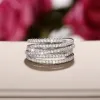 Bandas Huitan Luxury Cross Design Rings Full Paved Cz Stone Modern Fashion Modern Fomen's Rings Bodas de boda Bancos de joyería Envío