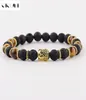 Oiquei Nowa moda Men039s Strand Bracelets Lava Rock and Natural Tiger Eye Stone i Lava Buddha Head Bead Bracelets GIF2053830