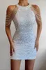 Abito da sera per club di festa di primavera da sera sexy bodycon tassel mini vestito vuoto fuori spalla senza maniche abiti con paillettes 240420