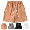 Shorts maschi in tessuto da forno atletico estivo con tasche elastiche della vita da coda gamba che corre in colore solido