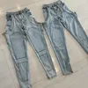 Kvinnors jeans 2024 Tung industrin Slimming high-end go-getter girl style mode oregelbundna ihåliga sömmar blixtlåssträcka