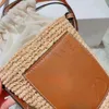 Lyxdesigner strandpåse singel axel crossbody väska liten hink väska kvinnors nya halm handvävd tygväska utomhus casual capacity shopping väska