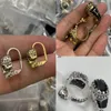 Gema negra con grabado antiguo Mujeres colgantes de pendientes colgándonas de 18 km de doras de oro Joya diseñadora de diseñadores MCQ69259E