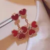 Projektantka Marka Van Love Kolczyki 925 Sterling Silver Flower Splated z 18 -karatowym złotem cztery czerwone chalcedony biżuterię wiszące serce