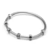 Brazalete creativo de acero inoxidable con titanio acero plateado 18k para parejas para hombres y brazalete de diseño de nueces