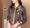 Dames Silk Blouses 2024 Klassieke geruite revershirt Spring herfst los dunne temperament top mode geometrische shirts blouse voor vrouwen