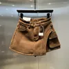 Saias 2024 Veludo de outono/inverno e design espessado pareça embrulhada Hip Salia curta Feminina lateral de bolso feminino roupas femininas