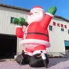 Activités de plein air en gros 12mh (40 pieds) avec ventilateur oxford matériau géant gonflable Santa Claus Christmas Old Father Cartoon à vendre