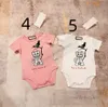 Baby Designer Rompers New Born Cartoon Lettre de combinaison imprimée Brand Girls Boys Climb Clothes Saut trottoir