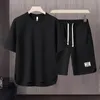 Mens Two Piece Set Summer Fashion Kort ärm T-shirt och shorts Lossa koreanska uppsättningar Män Designer Kläder Tracksuits240416