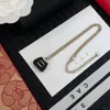 Collar de lujo en forma de oro diseñador de marca en forma de moda de chicas de moda collar de alta calidad Cabina de regalo colgante de alta calidad