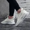 Scarpe da fitness uomini vulcanizzano uomo casual sport traspiranti tenis allenatori che volano intrecciati da uomo sneaker di moda maschile