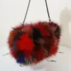 Schoudertassen Real Fur Hand Warmer Bag Merk Chain Winter Ladies Authentieke donzige schattige mode Luxe dames handtas